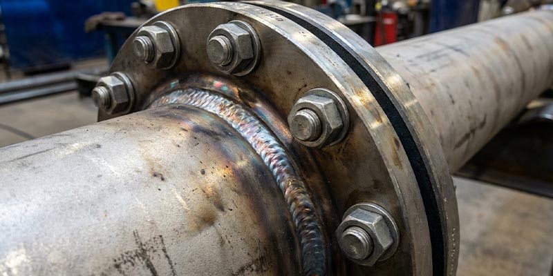 Detailed view of a welded flange with bolts and gasket