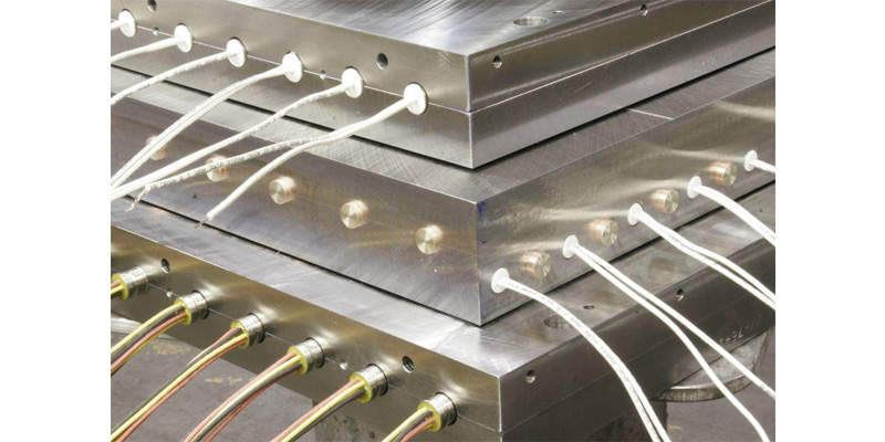 Cartridge heater installed in a precision machined metal block